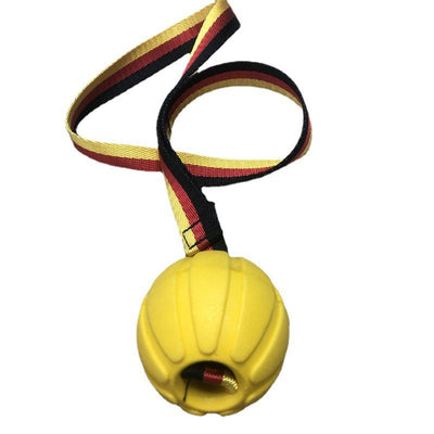Yellow EVA pet training ball with a black, red, and yellow striped tether, designed for water play. - Image 15