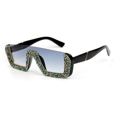 Black square sunglasses with a wavy top frame embellished with brown and clear rhinestones and gradient smoke lenses. - Image 17