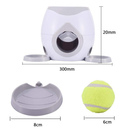 Smart pet feeder and tennis ball reward machine in white and lime green, with two mini tennis balls and a scoop. - Image 22