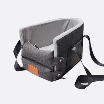 Dark gray portable pet car bed with white paw print and bone patterns, soft gray interior, and black straps. - Image 12