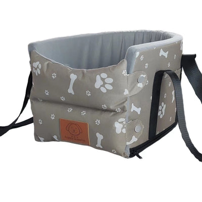Dark gray portable pet car bed with white paw print and bone patterns, soft gray interior, and black straps. - Image 16