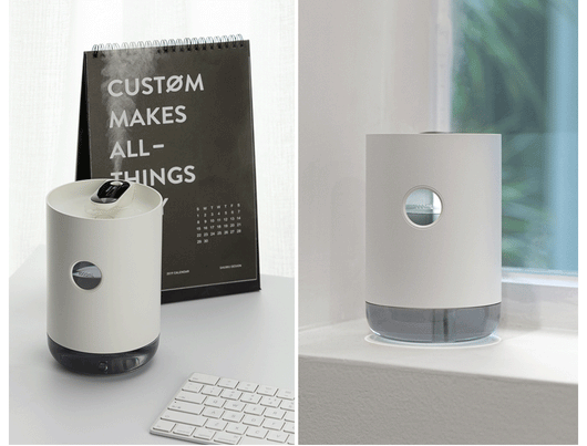 White cylindrical humidifier with a transparent base, digital display, and 1000ml capacity indicator. - Image 5