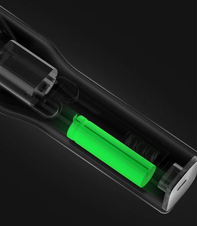 Black cordless hair shaver with a comb attachment and two white indicator lights, with a blurred white shaver in the background. - Image 15