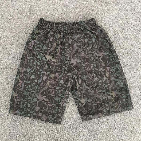 Shorts Reflectantes con Diseño Setas Coloridas
