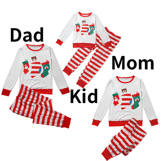 Red and white striped parent-child pajama set with a long-sleeved top featuring Christmas stockings and a bear graphic.