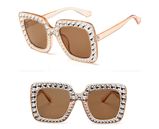 Oversized square sunglasses with clear peach frames, brown lenses, and clear faceted rhinestones around the edges. - Image 4