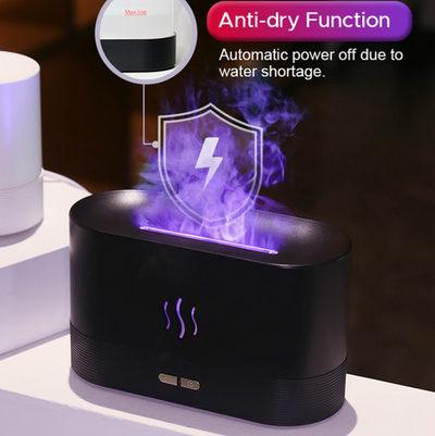 Black aroma diffuser with purple flame light effect and mist, featuring control buttons and a flame icon. - Image 6