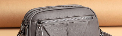 Bolso Bandolera Redondo de Cuero Genuino - Versátil y Elegante - Image 46