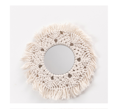 Circular mirror with a beige macrame fringe border, featuring intricate knotwork around the reflective surface. - Image 4