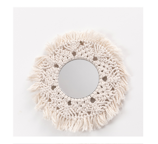 Circular mirror with a beige macrame fringe border, featuring intricate knotwork around the reflective surface. - Image 4