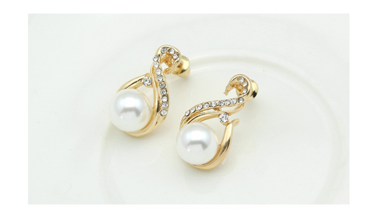 Gold-tone necklace and matching earrings set with white faux pearls and clear rhinestones, ideal for bridal or dinner wear. - Image 13