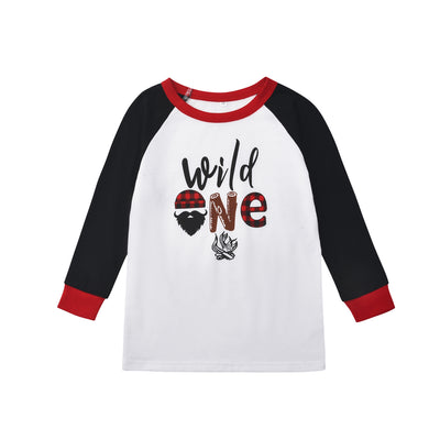 White long-sleeve pajama top with "wild one" graphic and red and black plaid pants. - Image 6