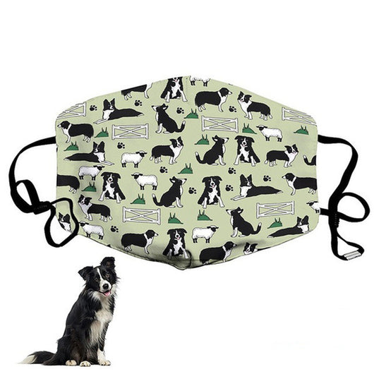 Light green face mask with a pattern of black and white Border Collies, sheep, fences, and paw prints. Features black adjustable ear loops. - Image 3