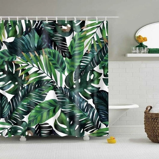 Tropical shower curtain with a vibrant green leaf print, including monstera and palm leaves, on a white background. - Image 14