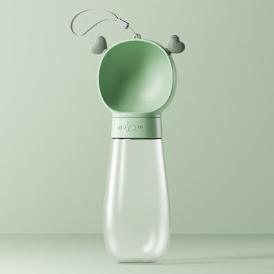 Yellow and clear portable pet water bottle with integrated drinking bowl and separate food container for walking dogs. - Image 13