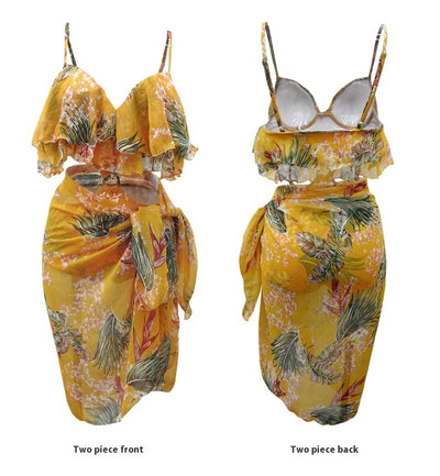 Pink tropical print three-piece women's swimwear set with ruffled bikini top, high-waisted bottoms, and matching sarong. - Image 17