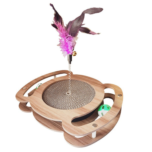 Multi-level cat scratcher with a round corrugated cardboard surface, a wooden track with a green ball, and a pink feather wand with a bell. - Image 5