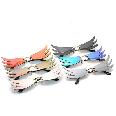 Rimless flame-shaped sunglasses with silver reflective lenses, gold metal temples, and black temple tips.