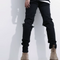 Jeans Slim Fit Cuadros Blanco y Negro con Detalles Rotos y Puños Elásticos