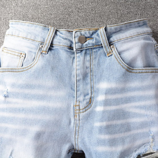 Jeans Azul Claro con Roturas Desgarradas - Image 11