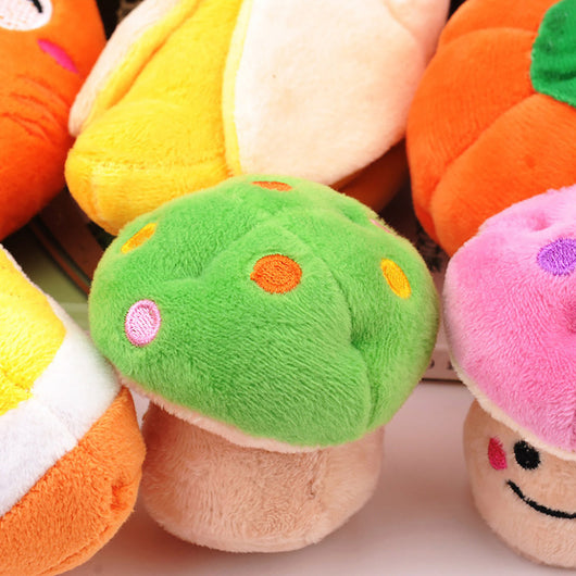 Purple plush eggplant pet toy with a green stem and an embroidered happy face, designed for dogs and cats. - Image 7