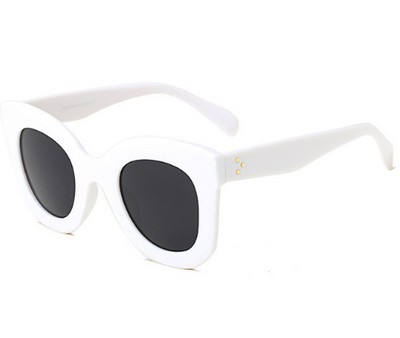 Transparent pink cat-eye sunglasses with gradient gray lenses, featuring a thick frame and vintage style. - Image 10