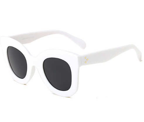 Transparent pink cat-eye sunglasses with gradient gray lenses, featuring a thick frame and vintage style. - Image 10
