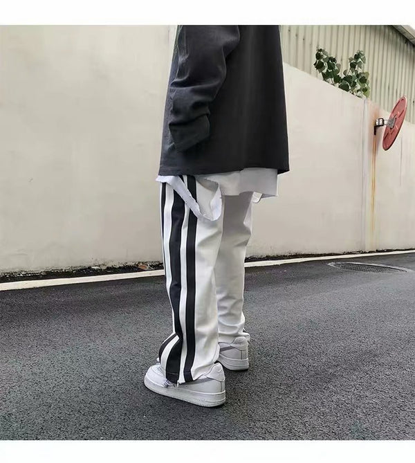 Pantalones deportivos de pierna ancha con abertura