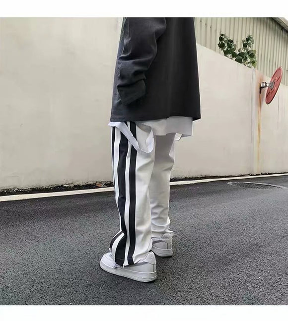 Pantalones deportivos de pierna ancha con abertura
