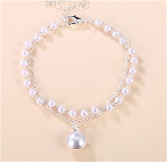 Pulsera de Perlas Doble Capa - Joya Versátil para el Verano