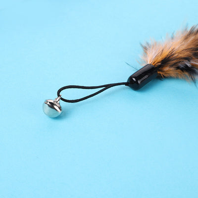 Long turkey feather cat toy with black, orange, and white stripes, featuring a small silver bell. - Image 8