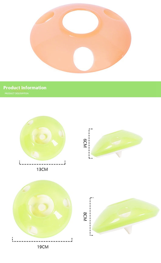 Green and white pet toy, a round food dispenser with multiple openings and a central spinning element for cats. - Image 9