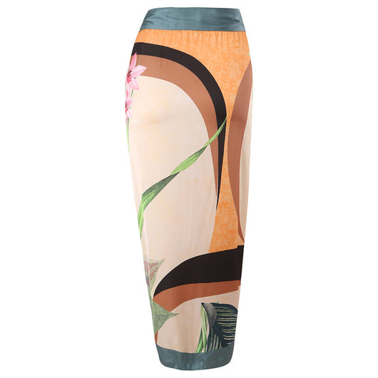 Two-piece tropical print swimsuit set with a V-neck one-piece and a matching long wrap skirt with tie waist. - Image 7