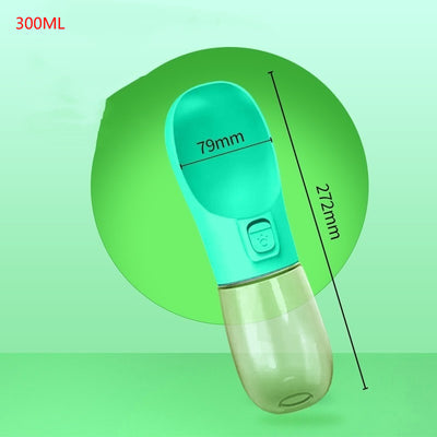 Pink portable pet water bottle with integrated feeder bowl, clear reservoir, and dispensing button for dogs. - Image 8