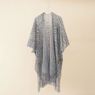 Chal Estola Leopardo con Borlas - Diseño Elegante y Versátil - Image 3