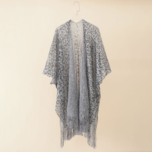 Chal Estola Leopardo con Borlas - Diseño Elegante y Versátil - Image 3