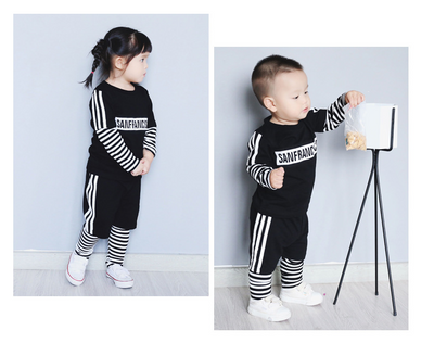 Black sweater suit with white stripes on sleeves and hem, featuring mirrored "SAN FRANCISCO" text on the chest. - Image 6