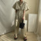 Jumpsuit de Trabajo Elegante con Cintura Ajustable y Múltiples Bolsillos