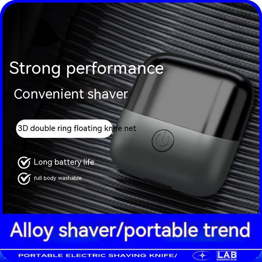 Silver mini electric shaver with a double-headed rotary design and a black power button on top. - Image 2