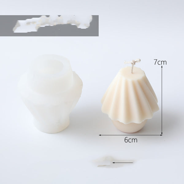 White silicone mold and a finished cream-colored lampstand-shaped candle with a wick, measuring 6.7cm tall. - Image 13