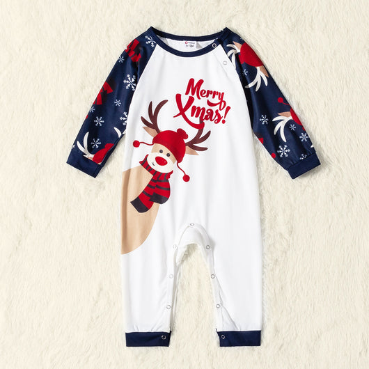 Matching family Christmas pajamas with white and navy blue long-sleeve tops, reindeer print, and "Merry Xmas!" text. - Image 17