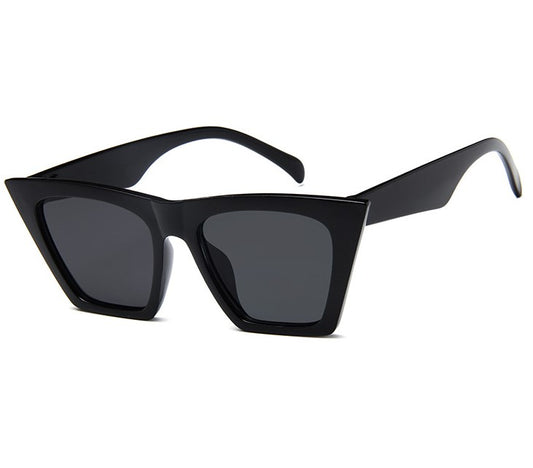 Transparent nude cat-eye sunglasses with brown gradient lenses, featuring a vintage 90s fashion style for women. - Image 2