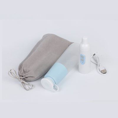 Portable electric bidet with translucent water bottle, white handheld spray unit, USB cable, and grey travel pouch. - Image 6