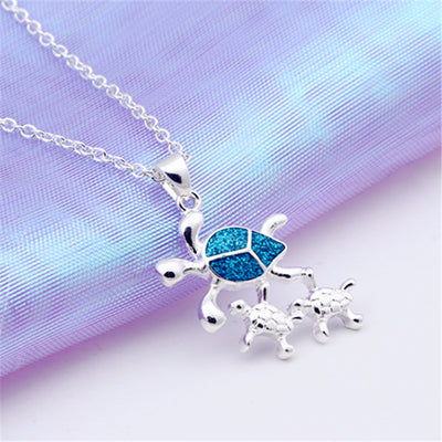 Collar de plata con colgante de tres tortugas para mujer