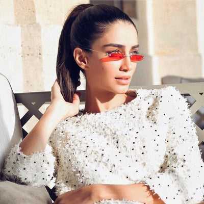 Rimless trendy sunglasses with rectangular orange lenses and gold-tone metal frames, featuring black temple tips. - Image 7