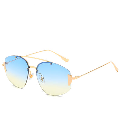 Women's fashion rimless sunglasses with blue to yellow gradient lenses and a gold-colored metal frame. - Image 7