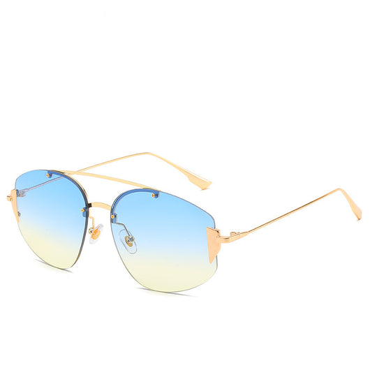 Women's fashion rimless sunglasses with blue to yellow gradient lenses and a gold-colored metal frame. - Image 7
