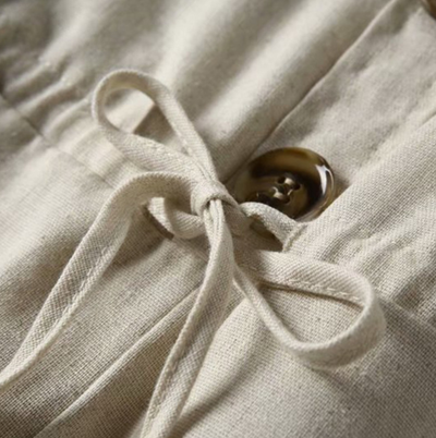 Pantalón de una pieza con botones en bolsillos - Image 9