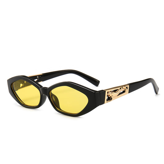 Angular cat-eye sunglasses with a tortoiseshell frame, brown gradient lenses, and gold jumping cheetah temple details. - Image 12