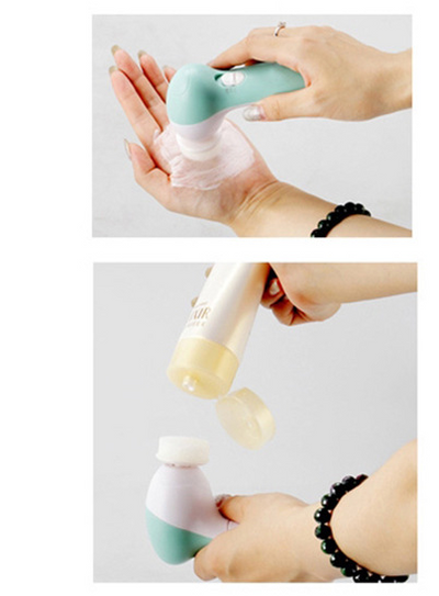 White electric facial cleanser with multiple brush and sponge attachments in an open translucent teal carrying case. - Image 19